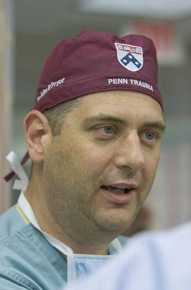 John P. Pryor, MD, wearing scrubs and a surgical cap with the Penn shield in approximately 2008. 